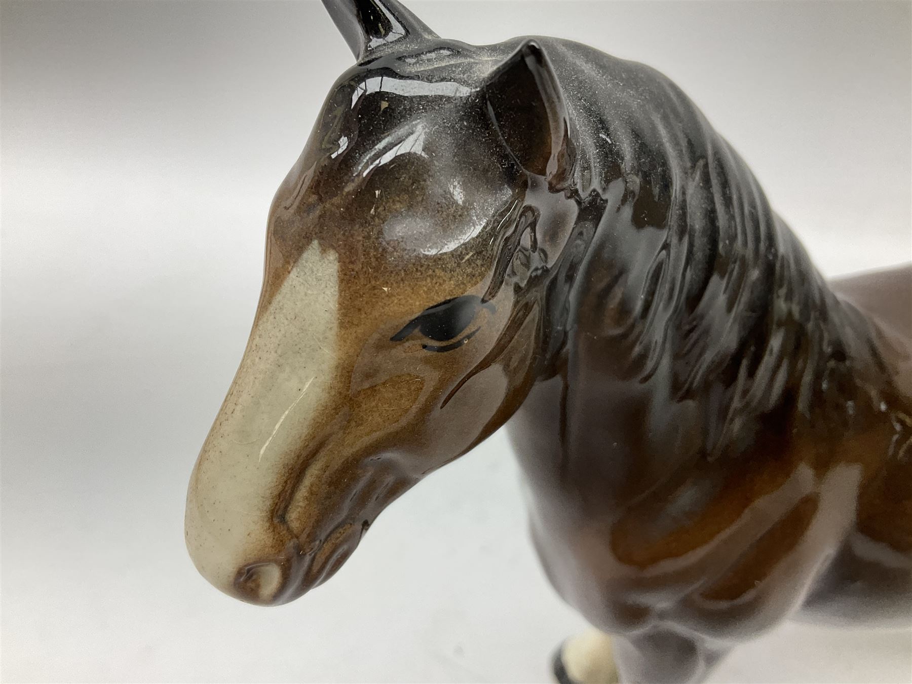 Seven Beswick figures of horses, including Connemara pony in grey no.1641, Arab in bay no.1265, large foal in grey no.947 etc, together with a Goebel figure of a horse (8)