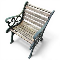 Pair of cast iron and wooden slatted chairs