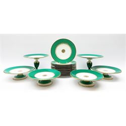 A Victorian dessert service, comprising two tazzas, four comports, and twelve plates, with green banded decoration heightened with gilt, with pattern number 1717 beneath, tazzas H16cm, comports H7cm, plates D23cm