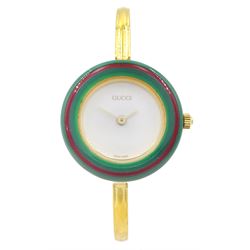 Gucci ladies gold-plated quartz wristwatch, Ref. 11/12.2, with eleven interchangeable coloured ring bezels, boxed with warranty card dated 1997 