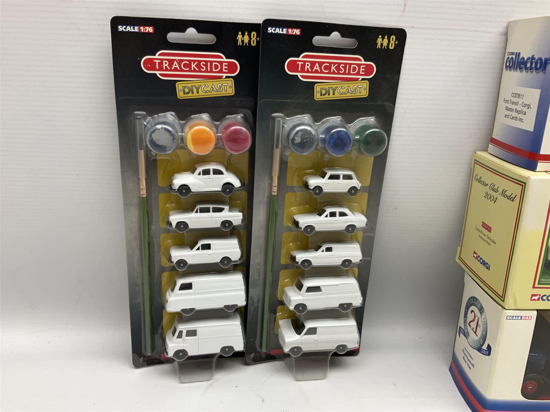 Corgi - eighteen modern die-cast models including racing cars, Land Rovers, Thornycroft Box Van, Ford Transit and Bedford Vans, Minis, Last Routemaster bus, two Trackside DIYCAST sets etc; all boxed (18)