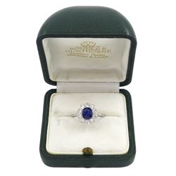 Palladium and platinum milgrain set oval sapphire and diamond cluster ring, sapphire approx 1.35 carat, total diamond weight approx 0.55 carat