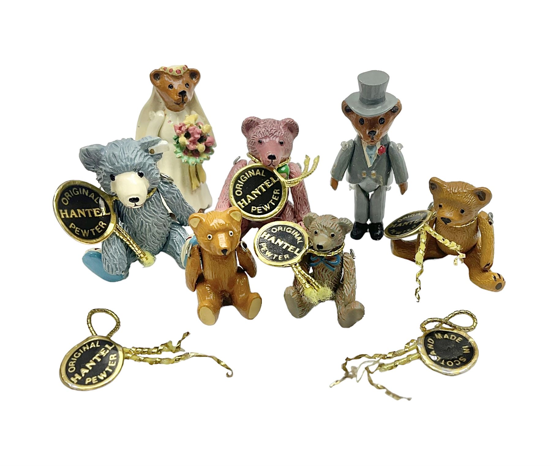 Seven Hantel miniature articulated pewter teddy bears, including bride and groom 