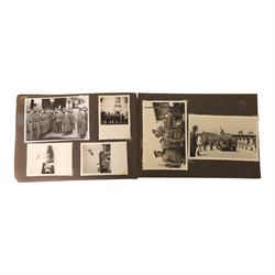 WWII German Soldiers photo album, 1942, including photographs of soldiers in uniform posing during parade etc  
