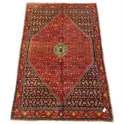 Persian Bijar red and blue ground rug, c