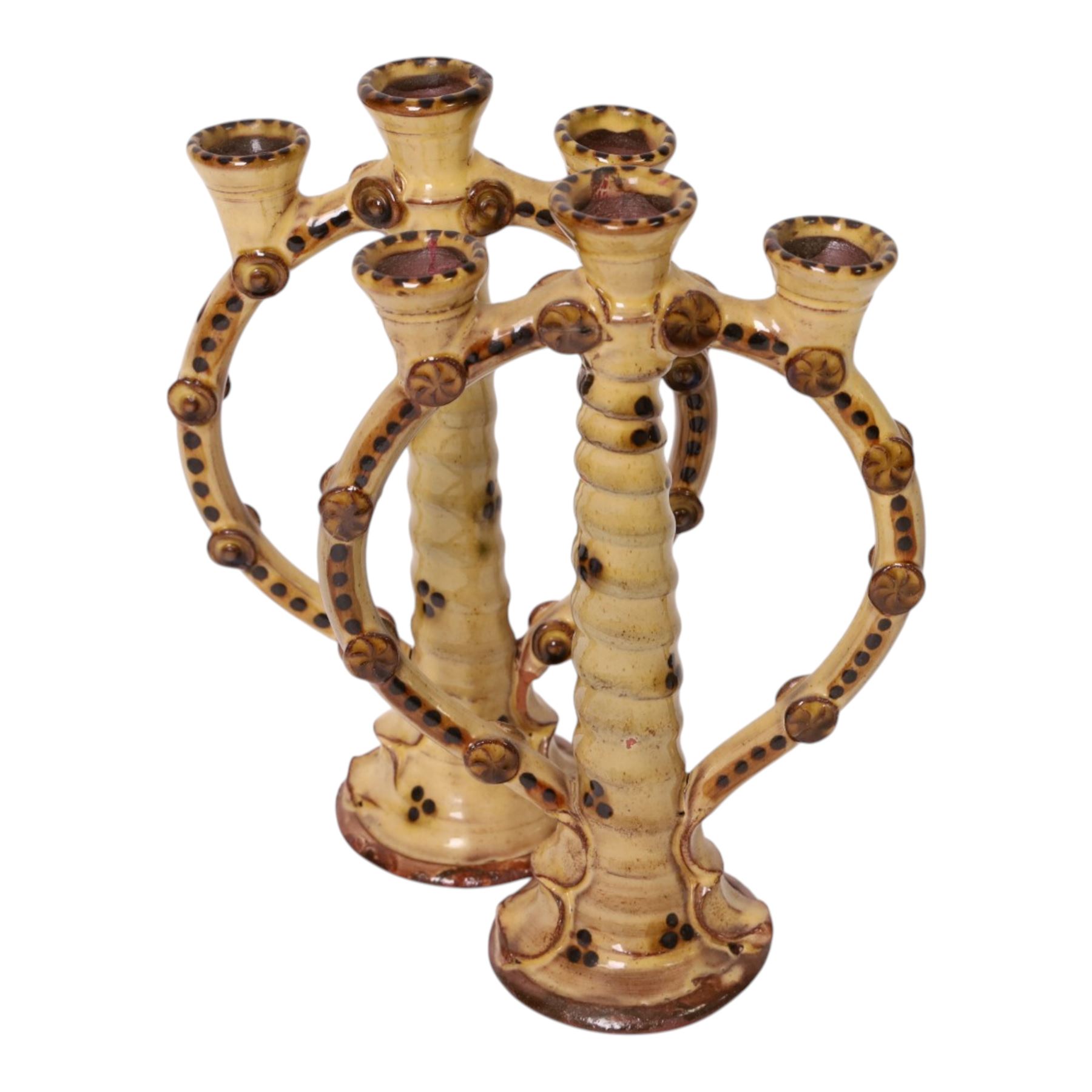 Pair of studio pottery candlesticks, with a central twisted column bordered by circular supports, H24cm 