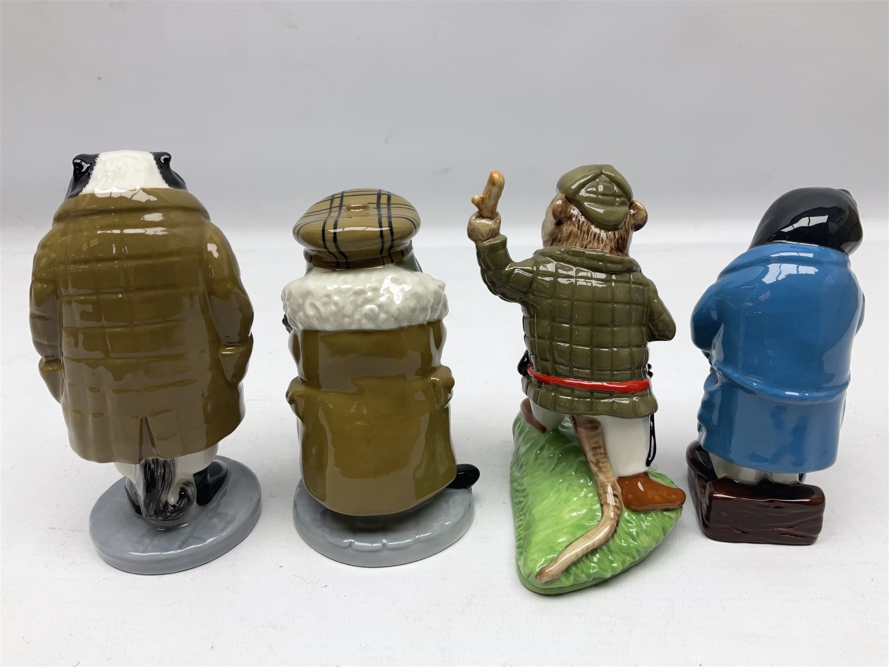 Twelve Wade Collectors Club Figures, comprising six Wind in the Willows figures; Rattie, Mole, Toad, Badger, Weasel and Rattie and Mole on the Water, Six Peter Pan figures; Captain Hook, Peter Pan, Wendy, John, Michael and Tinkerbell  