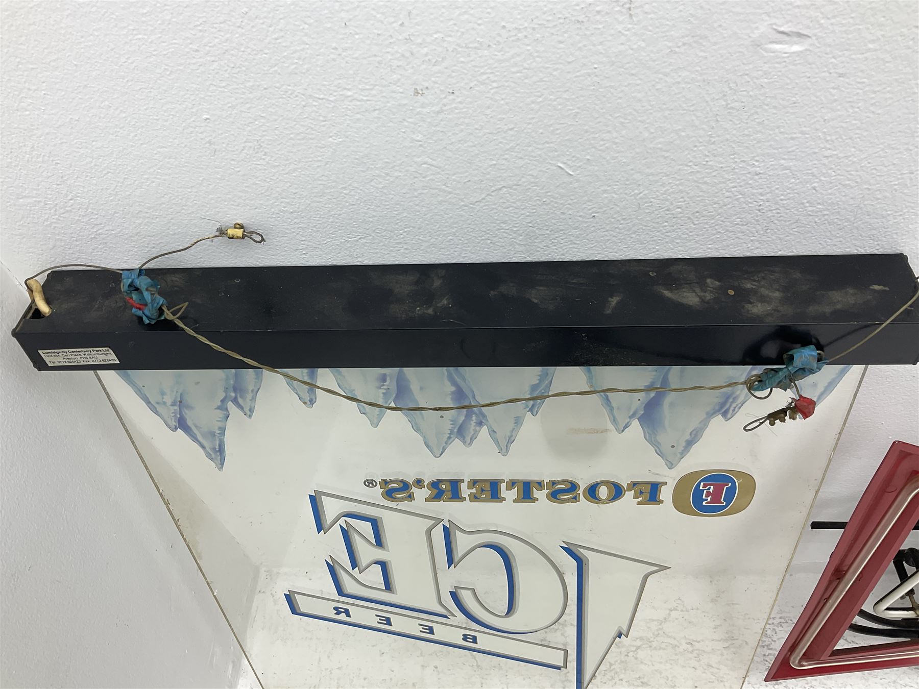 Electric neon Budweiser advertising sign, together with a Foster's example etc