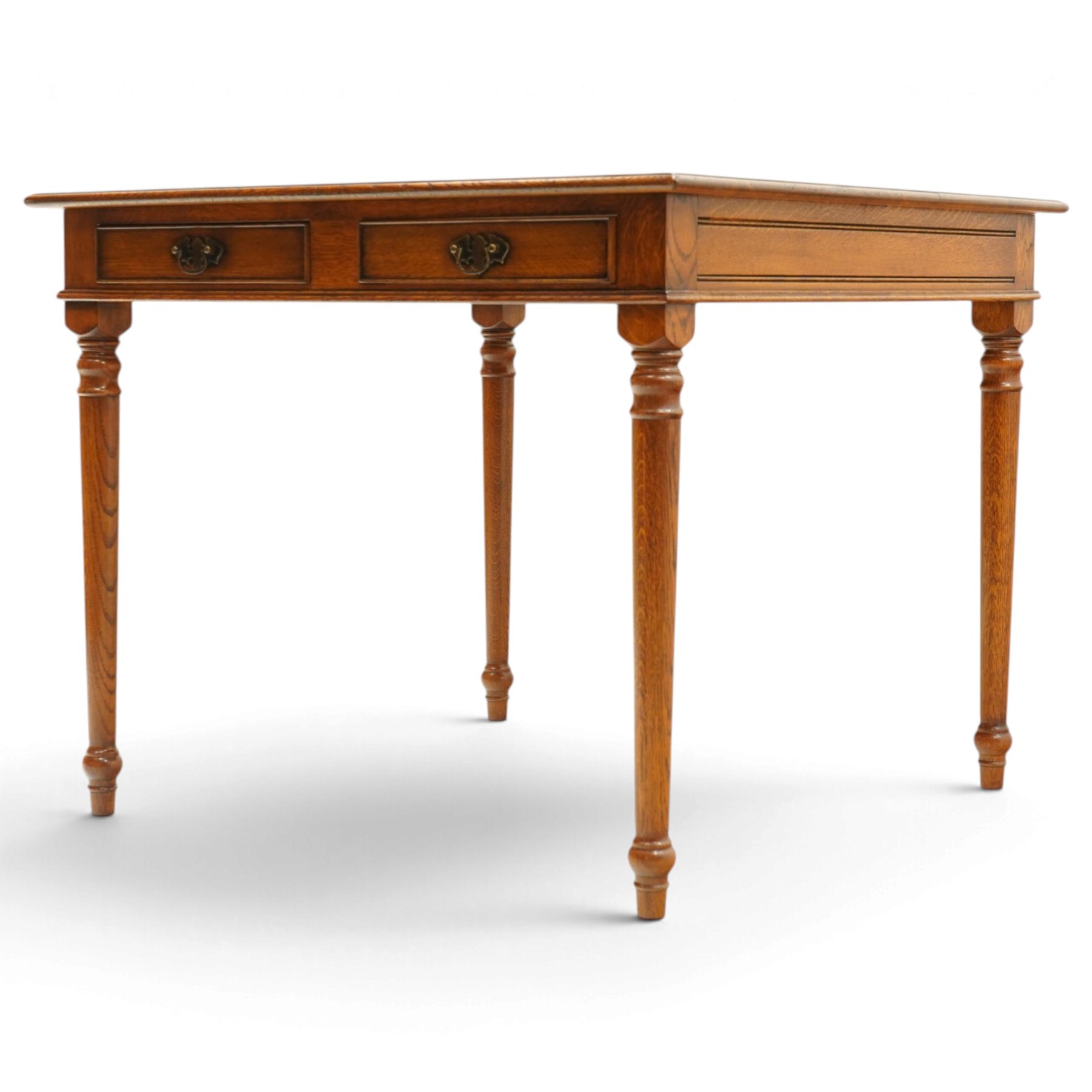 Georgian design honey-oak breakfast table of square form, the moulded edge fitted with two cock-beaded drawers, raised on turned and tapering supports