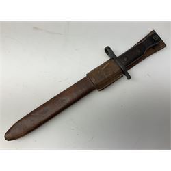 WW1 Canadian Ross Rifle Co. 1907 Model Mk.II bayonet with 25.5cm steel blade; dated 11/15; in leather scabbard with owner's manuscript service number verso; and leather frog L42cm overall; and Yugoslavian Model 1924/30 bayonet in steel scabbard, both numbered 1190 (2)