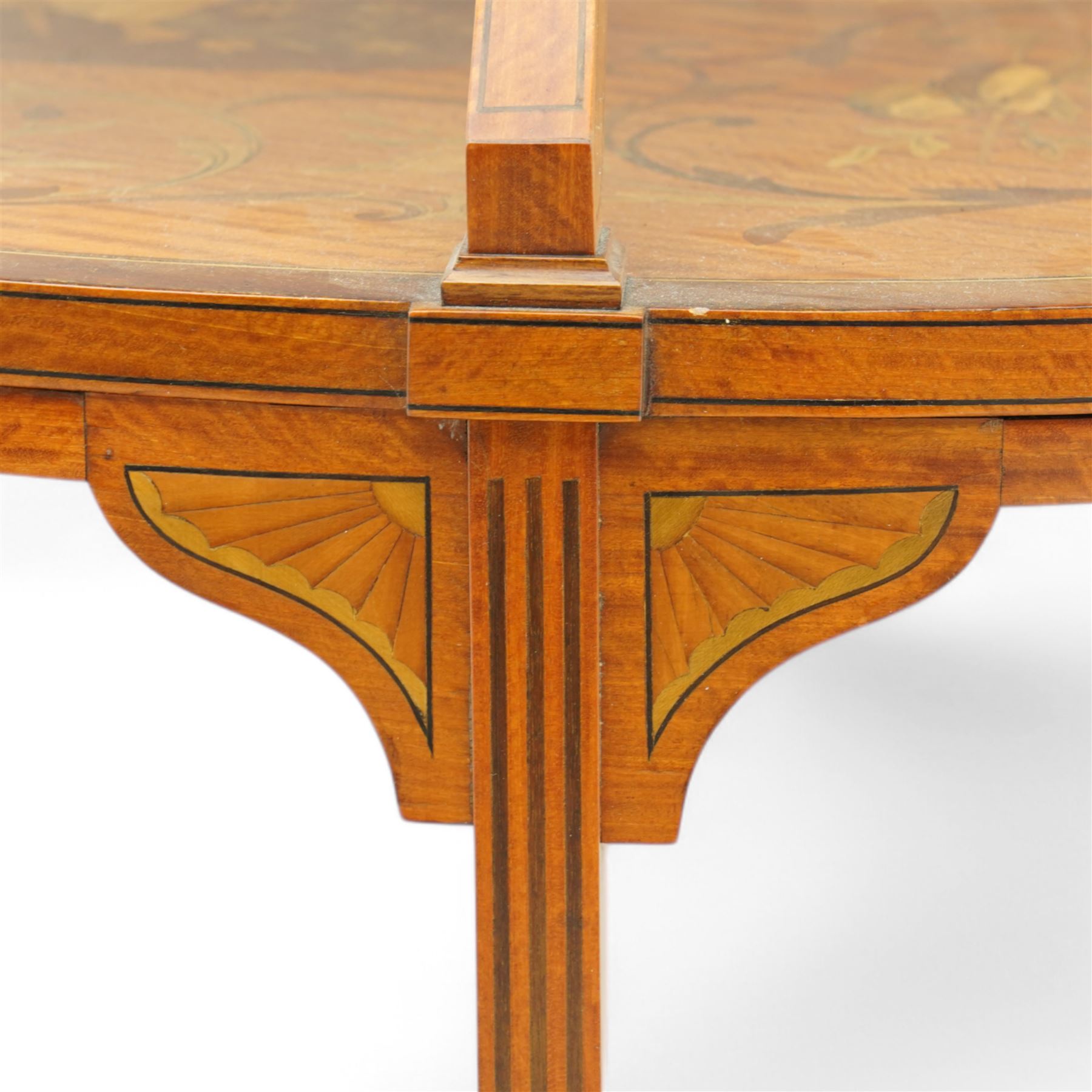 Edwardian inlaid satinwood etagere, removable tray top with glass base and brass carrying handles, two graduating tiers each inlaid with central oval panel depicting lute and flute with manuscript, enclosed within a scrolling acanthus leaf border, on square tapering supports with splayed feet, decorated with shaped and fan inlaid corner brackets, united by curved X-framed stretchers 