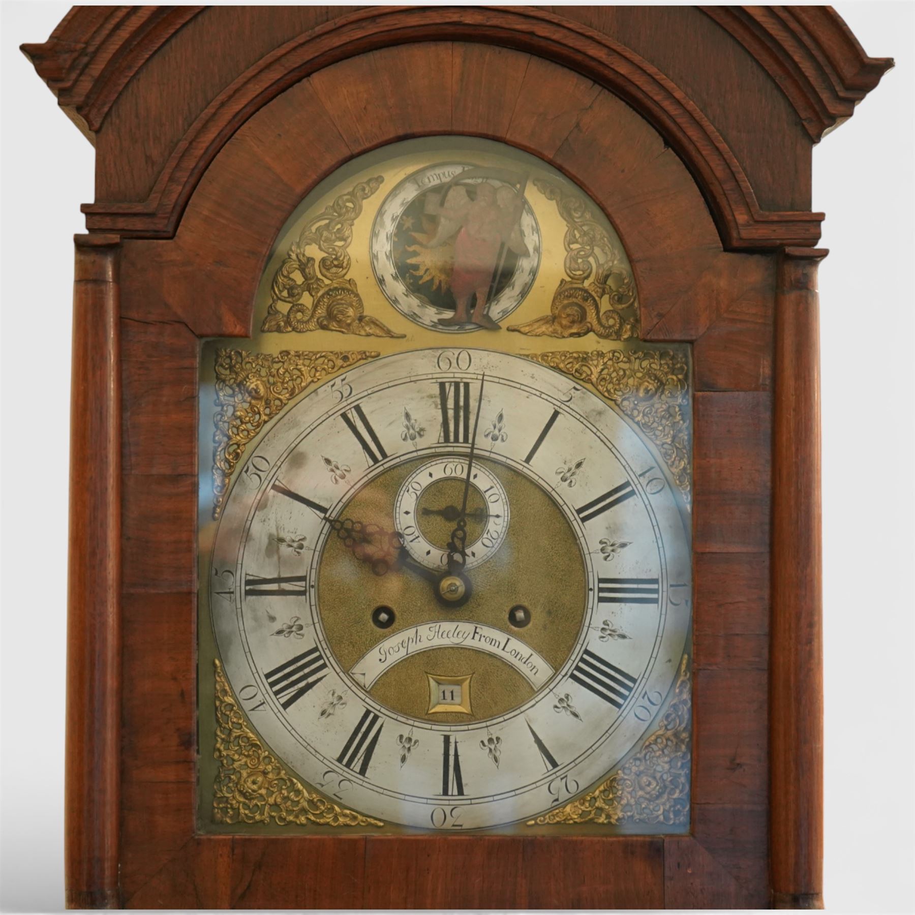 18th century longcase clock, the brass dial with ormolu spandrels, Father Time automaton and inscribed 'Joseph Heeley from London' with seconds ring and eight day movement in oak caddy top case, the trunk door with mahogany crossbanding H248cm