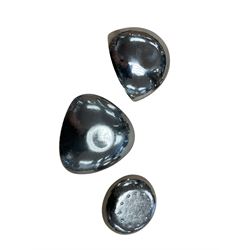 Keswick school of art hammered with fluted rim, together with three Keswick dishes 