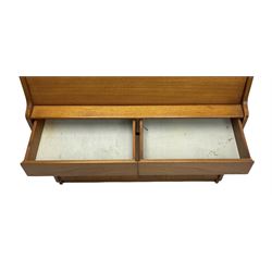 Remploy - mid-20th century teak bureau, the fall front enclosing fitted interior, two drawers over double cupboard