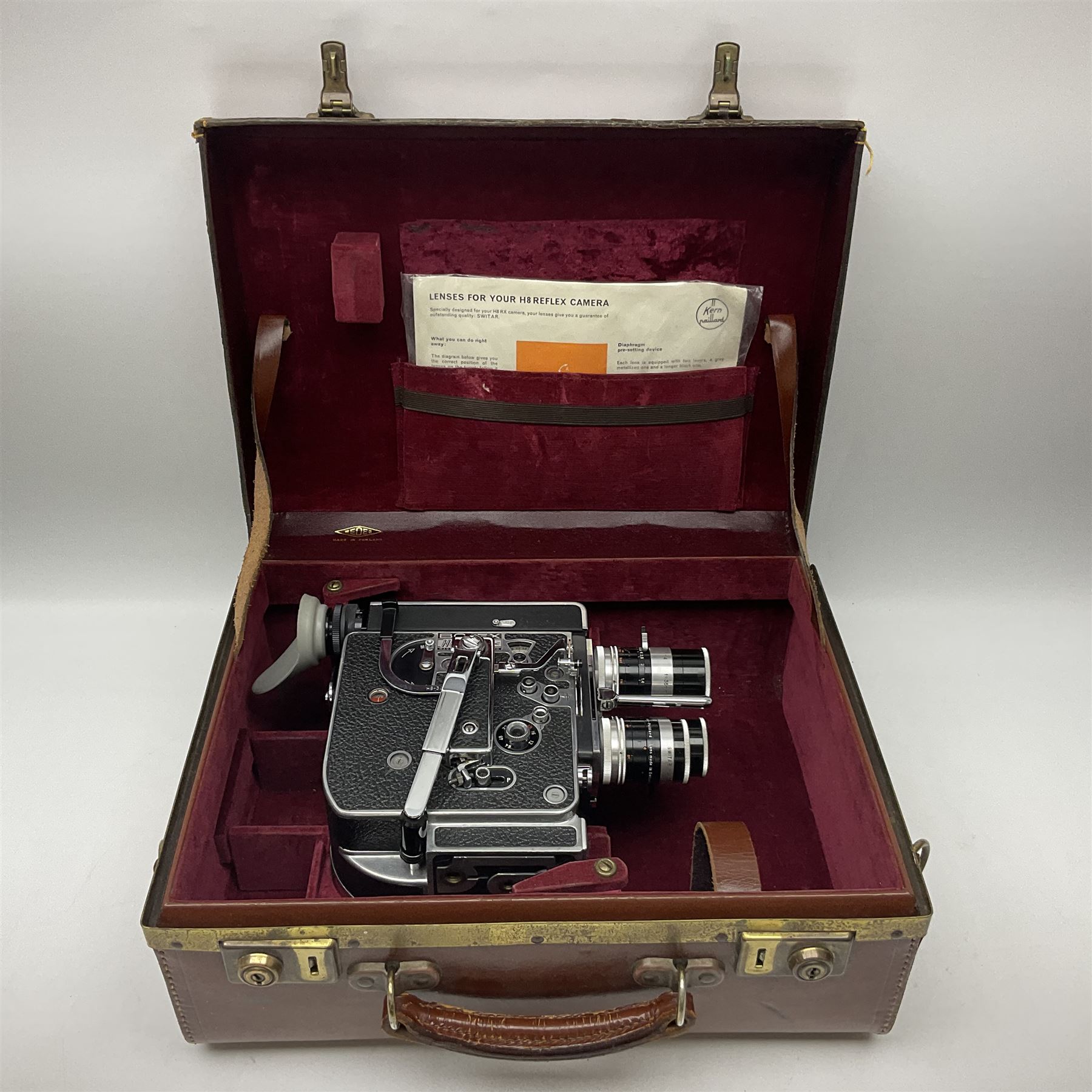 Paillard Bolex H8 RX4 cine camera body with turret for interchangeable lenses, serial no. 216071, with 'Macro Switar H8RX f1.4 36mm' lens, serial no.863406, 'Macro Switar H8RX f1.3 12.5mm' lens, serial no. 865770, 'Switar H8RX f1.6 5.5mm' lens, serial no. 937691 and RX fader, in fitted leather case