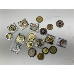Sixty-nine American challenge coins of military and security force interest including FBI, OSI, IRS, Customs, Iraq War etc, two in easel display cases; together with two unopened packs of playing cards for Iraqi Most Wanted and Radacad