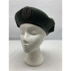 Four paratrooper berets - Russian, Italian, British and Foreign Legion; all with badges (4)