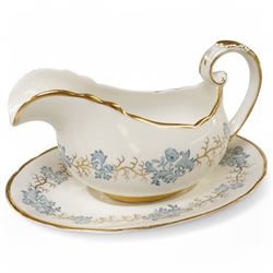 Tuscan Avondale dinner and coffee service for twelve covers with a blue and gilt border pattern comprising  twelve dinner plates, twelve dessert plates, twelve side plates, twelve two handled soup bowls and stands, four vegetable dishes and covers,  four graduated meat plates, sauce boat and stand, twelve coffee cups and saucers and twelve tea plates (106)