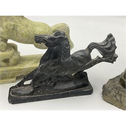 Cornish carved serpentine model of a lighthouse, together with a Chinese soapstone figure of a horse, another carved horse figure and a carved hardstone armadillo
