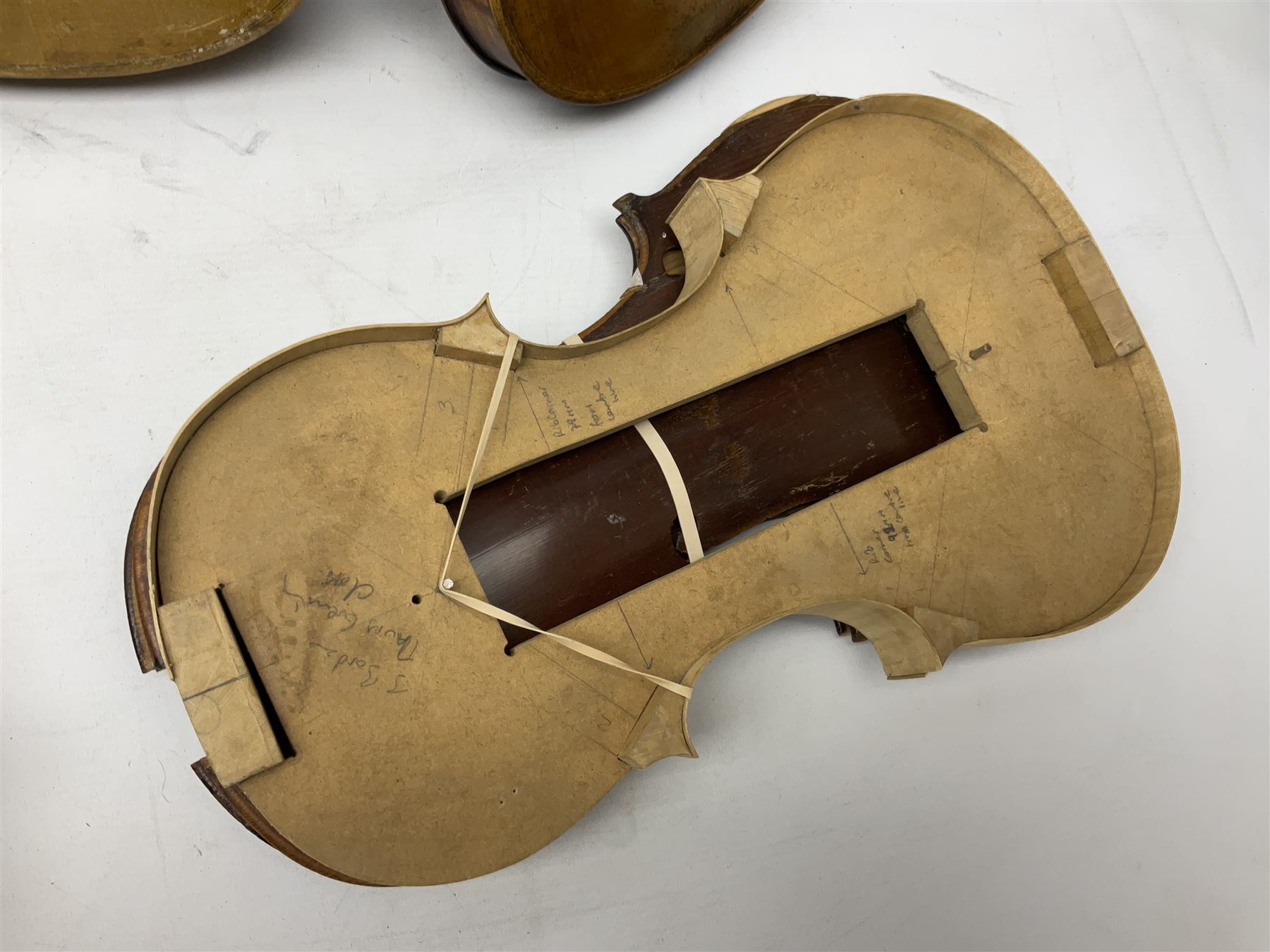 French violin for restoration with 36cm two-piece maple back and ribs and spruce top, bears label 'Lutherie Artistique M. Couturieux'; in wooden case; two modern three-quarter size violins in cases; and five violins for spares or repair