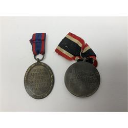 Five WW2 German medals/badges -German Defences West Wall Medal, War merit Cross, Red Cross Decoration, RAD tinnie brooch and Adolf Hitler 1934 medallion (5)