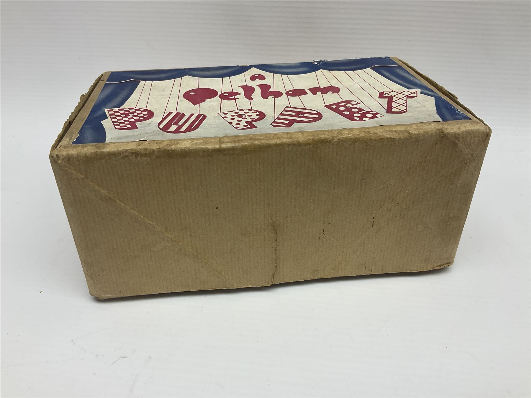 Pelham Puppet - three puppets comprising a painted wooden duck with felt mouth and wings with metal joints H12cm, in original box and instructions; and two further examples Type A cat with a hollow body H12cm, and a boy H23cm (3) 