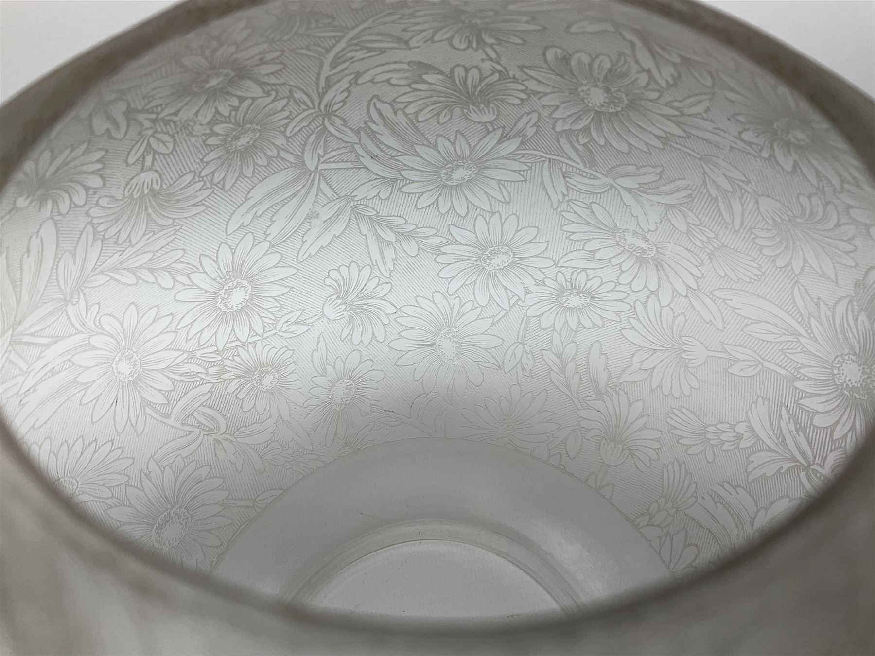 Victorian table standing oil lamp, brass fittings, cranberry glass reservoir, brass column on black enamelled ceramic base, with a frosted glass shade and clear glass chimney, H68cm