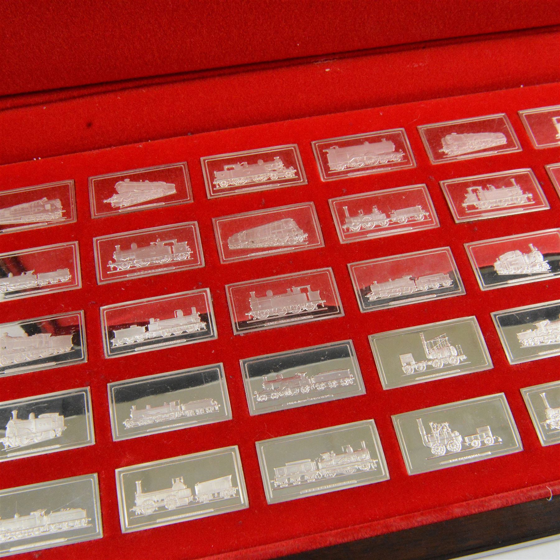 Set of fifty 'Great British Locomotives' silver ingots by  John Pinches, rectangular ingots depicting a different locomotive to each, hallmarked John Pinches, London 1978, in wooden presentation case