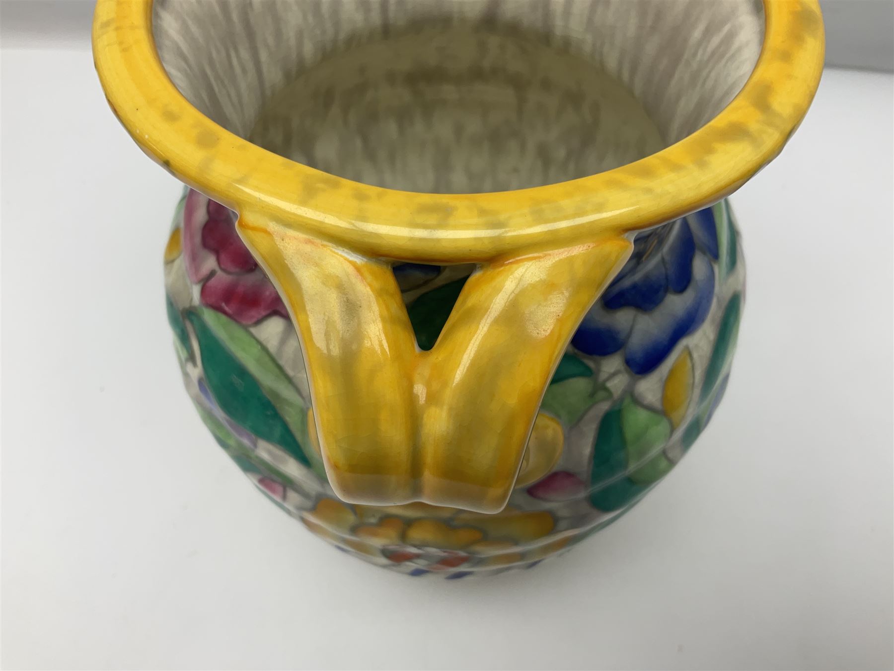 Charlotte Rhead Crown Ducal jug, decorated in the Persian Rose pattern, with printed and painted marks beneath