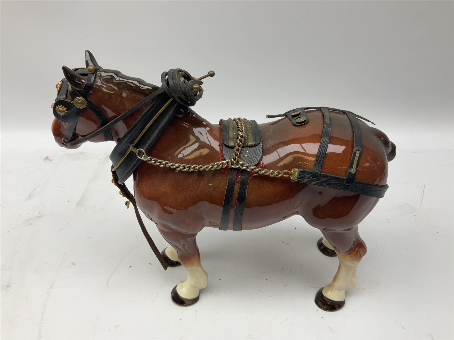 Four Melba Ware Shire horse figures and another similar, and three wood carts