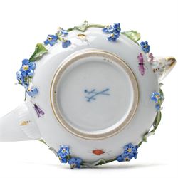 Early 19th century Meissen covered milk jug, of squat ovoid form with elongated handle, the body with encrusted forget-me-not floral decoration and leaves, with painted insects, underglaze blue crossed swords mark to base, W15cm