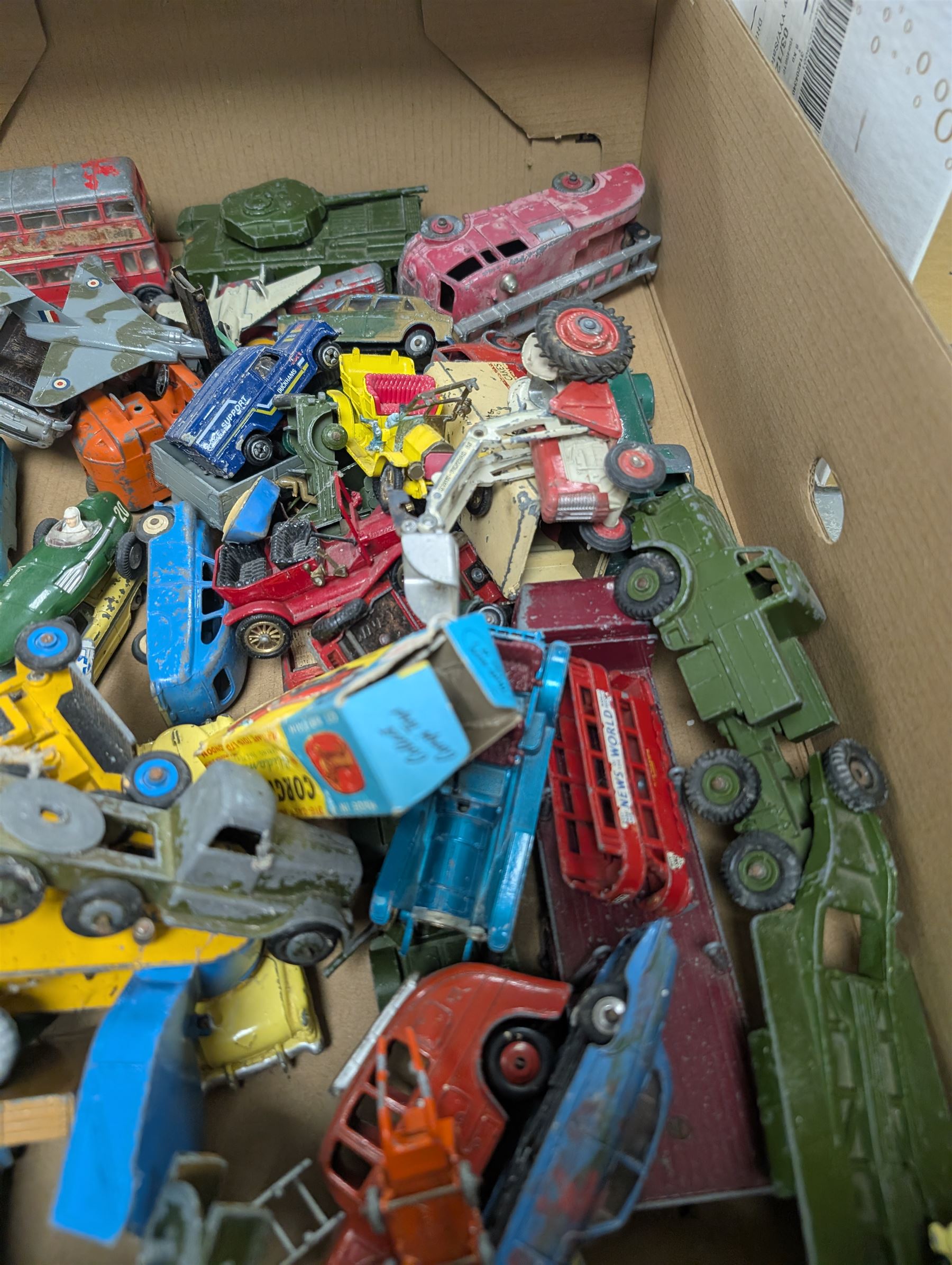 Collection of diecast model vehicles, including Dinky and Corgi examples, mostly loose and playworn