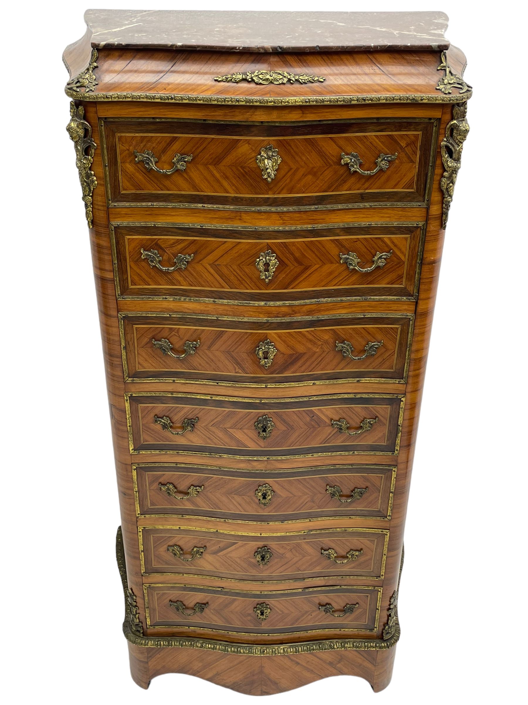 Mid-20th century Louis XVI design Kingwood and walnut secretaire à Abattant, shaped serpentine form with dark rouge variegated marble top, the fall front disguised as three drawers enclosing birdseye maple interior with shelf, drawers and writing surface, four functioning drawers below, decorated with cast gilt metal mouldings and mask cartouches, on skirted base with egg and dart moulded gilt metal edge