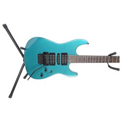 Squier by Fender Stagemaster six string electric guitar, in metallic green finish, serial no. KC00124999, L102cm