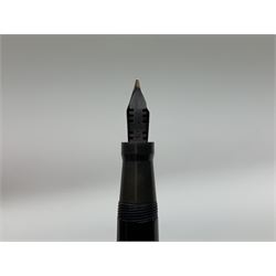 Vintage Swan Mabie Todd lever fill fountain pen in coral red, the nib a/f marked 14K, together with two further vintage Swan Mabie Todd fountain pens, the first example with lever fill, the other leverless, each with black body, one with nib marked 14ct, (3) 