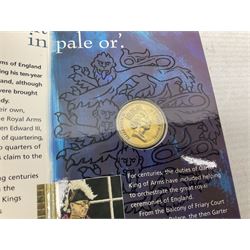 The Royal Mint United Kingdom 1984 brilliant uncirculated coin collection, 1997 and 2001 commemorative crown coins, 1997 old round one pound, all in card folders and four sterling silver medallic first day covers from the 'Great Britons' collection housed in a blue folder