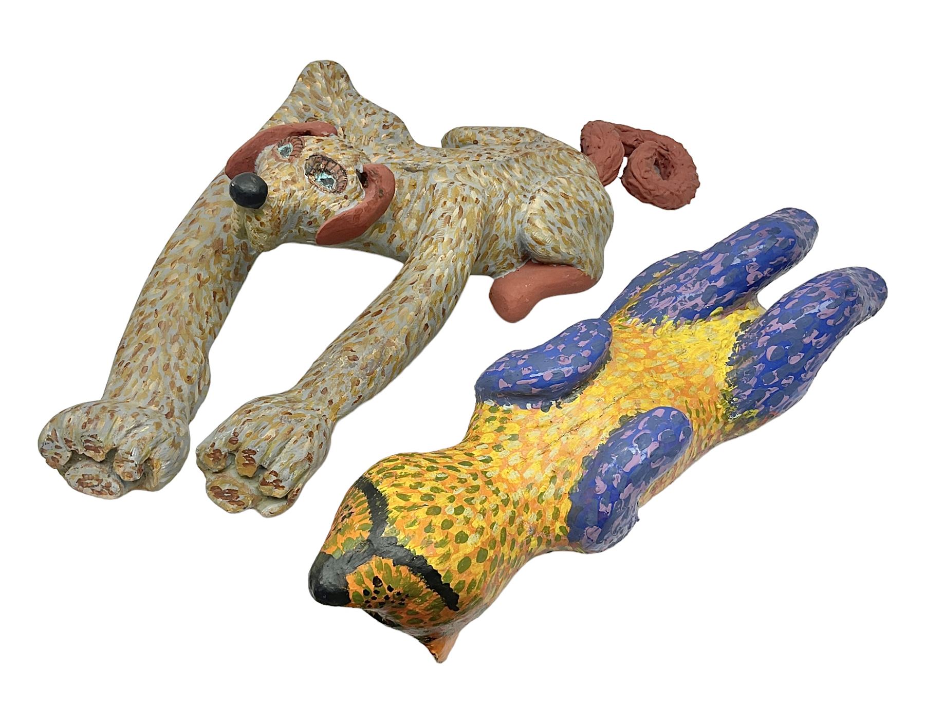 Helen Skelton (British 1933 – 2023): Two carved wooden abstract sculptures, one modelled as a dog, the other modelled as a bear, both with painted stippled decoration, largest H20cm. Born into an RAF family in 1933 in Kent and travelled the world extensively during her childhood. After settling in Bridlington, Helen immersed herself in painting, textiles, and wood sculpture, often inspired by nature's beauty. Her talent was showcased in a one-woman show at Sewerby Hall and recognised with the sculpture prize at Ferens Art Gallery in 2000. Sadly, Helen’s daughter passed away from cancer in 2005. This loss inspired Helen to donate her sculptures to Marie Curie upon her passing in 2023.