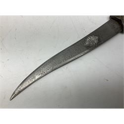 Indian Khanjar dagger with 28cm curving damascus steel blade inlaid with silver floral emblem, white metal and niello style grip in the form of a bird's head with pronounced beak and matching scabbard L44cm overall