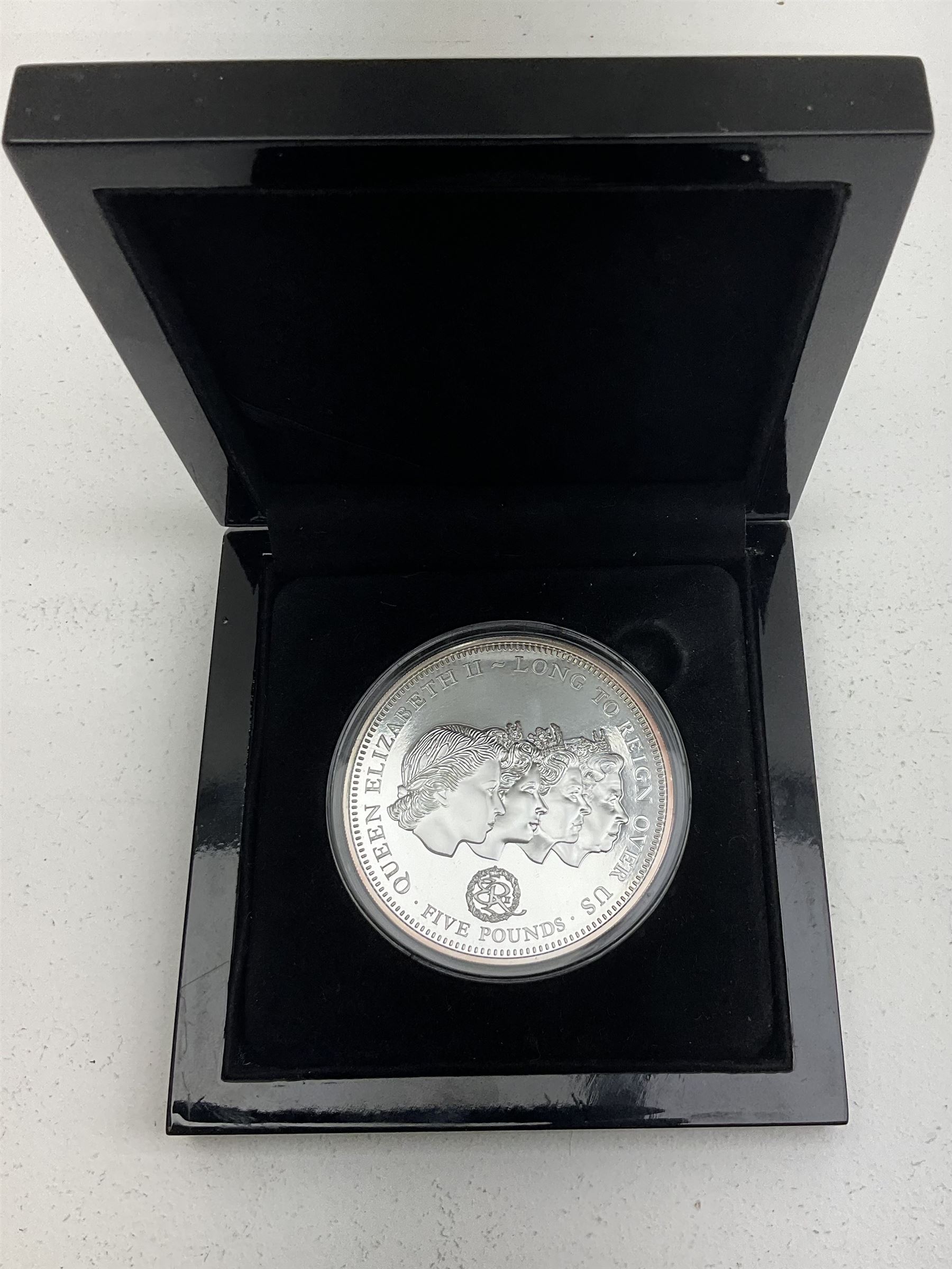 Queen Elizabeth II Tristan Da Cunha 2015 'The Five Portraits of Her Majesty' fine silver proof five ounce five pound coin, cased 