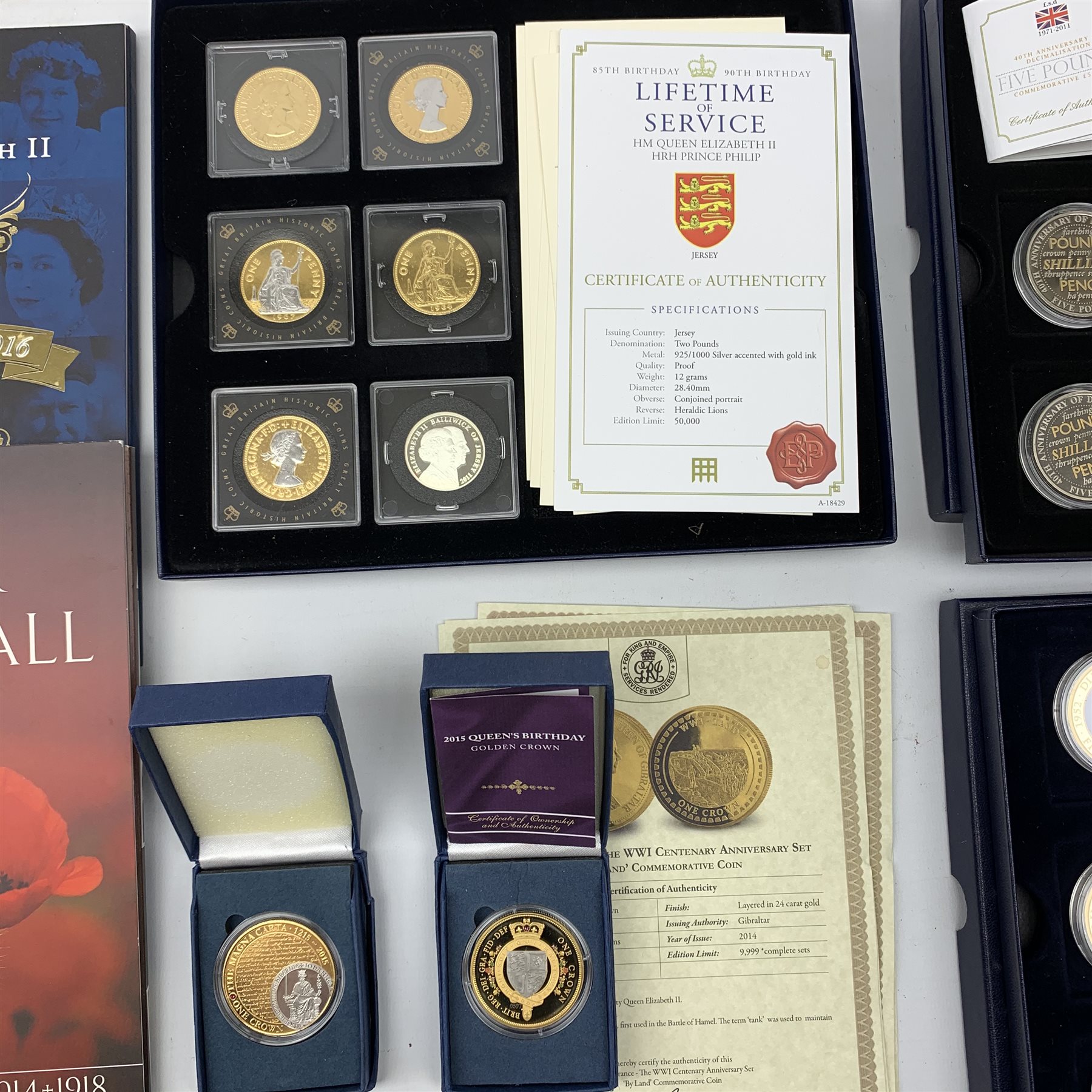 Modern commemorative coins including various Westminster 'Diamond Jubilee' fifty pence coins, three 2011 Bailiwick of Guernsey '40th Anniversary of decimalisation' five pound coins, Bailiwick of Guernsey 2011 commemorative poppy shape five pound coin etc