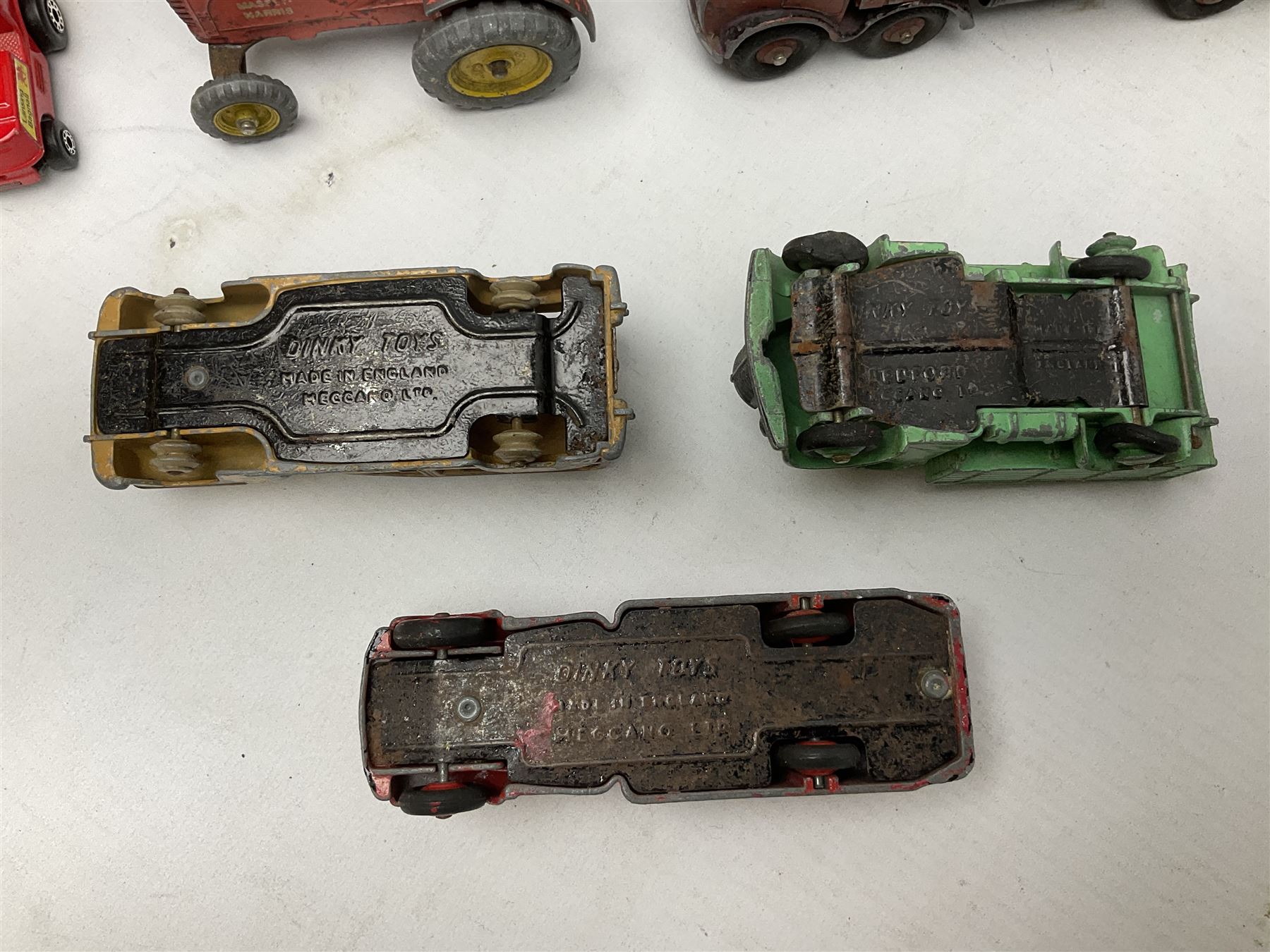 Dinky - sixteen unboxed and playworn die-cast models including Foden lorry, Big Bedford lorry with Halesowen Farm Trailer, Thunderbolt land speed record car, Spirit of the Wind racing car, market garden truck, Bedford tipper, station wagon, tanker, motorcycle combination etc; two Corgi models; and five Matchbox/Lesney models (23)
