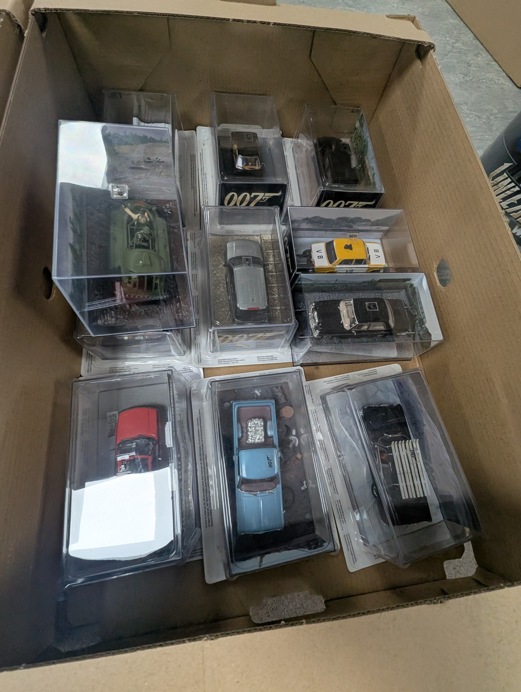 Large collection of James Bond 007 diecast model vehicles, mostly GE Fabbri, and a collection of associated magazines, in five boxes