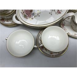 Royal Doulton Canton pattern dinner service for eight covers, comprising dinner plates, side plates, twin handled soup bowls and saucers, dessert plates, one saucer boat and saucer, two covered tureens and one oval dish (37)