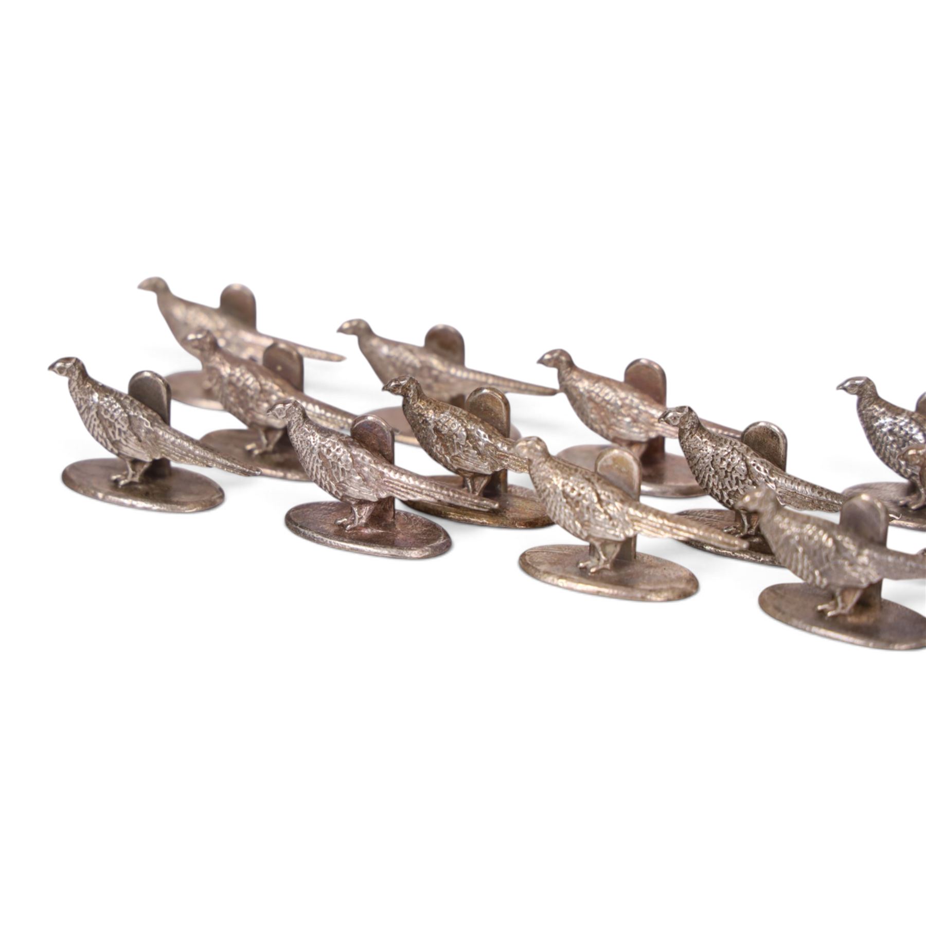 Set of twenty-four pheasant place holders, on oval base, H3cm