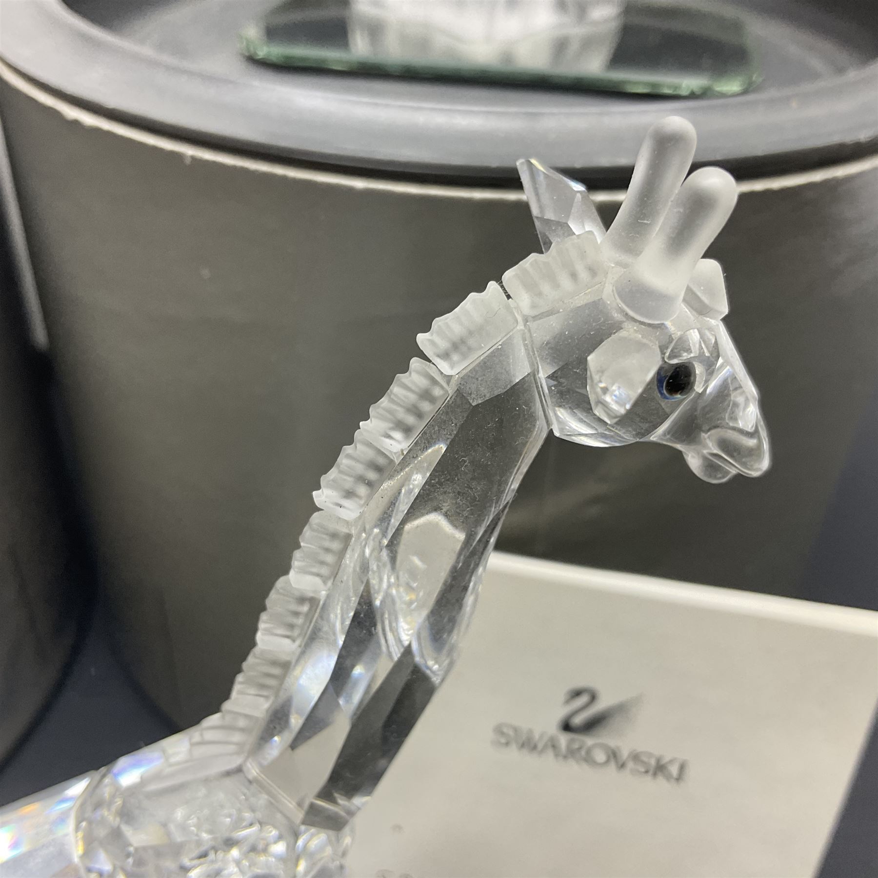 Five Swarovski Crystal figures, comprising giraffe, deer, hummingbird, rose and rearing horse, all with original boxes 