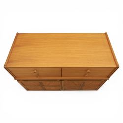 Nathan - pair of sideboards, rectangular top over four short drawers, above signature square panelled cabinet doors on a recessed plinth base