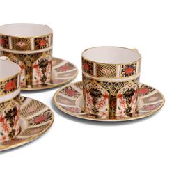 Eight Royal Crown Derby Old Imari 1128 pattern coffee cans and saucers