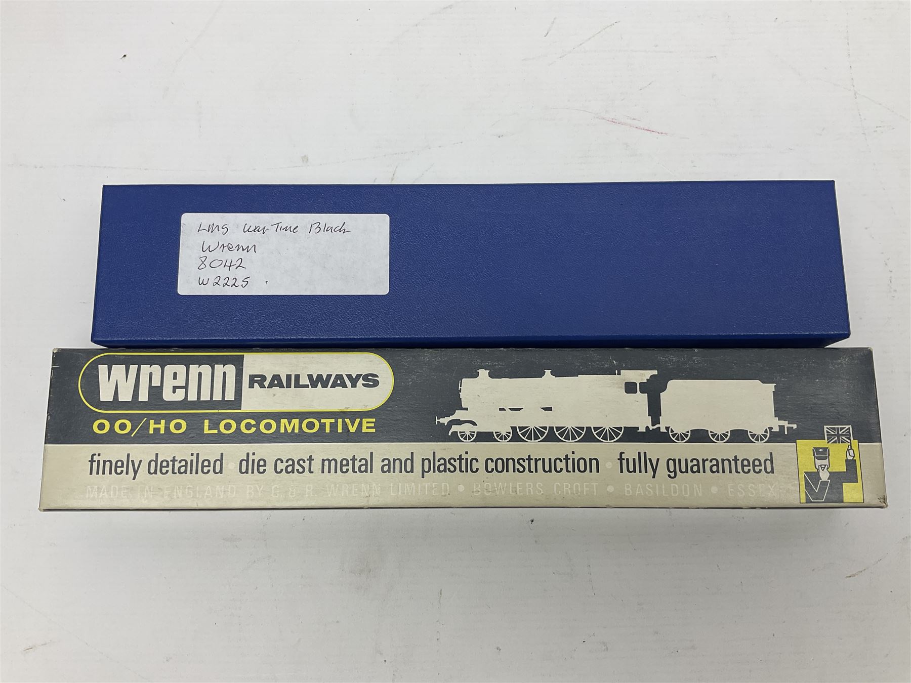 Wrenn '00' gauge - two Class 8F 2-8-0 locomotives - No.48073 in BR Plain Black; boxed; and No.8042 in LMS Plain Black; with unassociated plain blue box (2)
