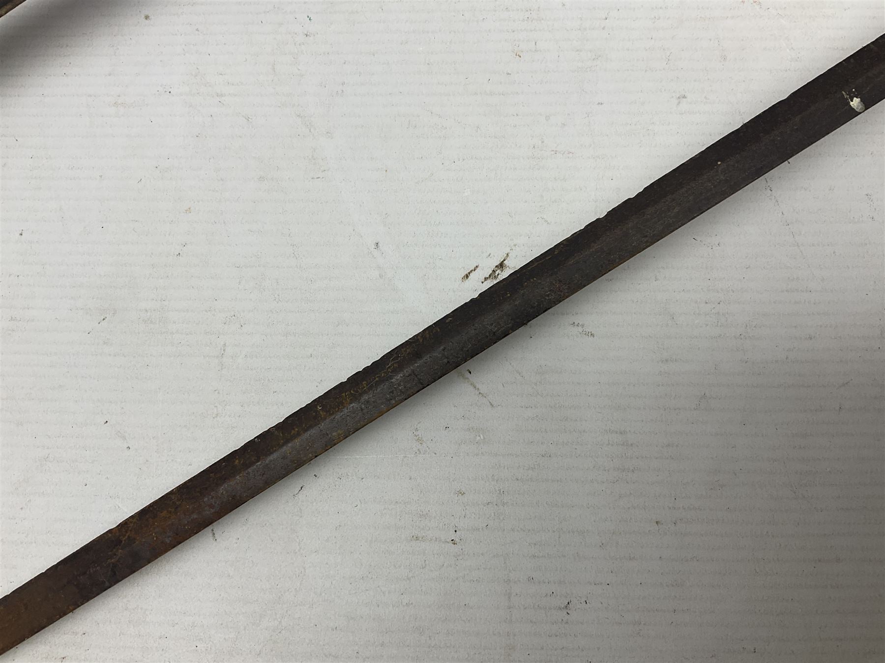 Victorian 1845 pattern infantry officer's sword the 82cm sharpened fullered steel blade with traces of decoration, brass gothic hilt incorporating Victorian cypher, folding back guard, stepped pommel with acanthus leaf backstrap and wire-bound wooden grip with traces of original fish skin covering L96cm overall; together with a reproduction Scottish style basket hilted sword; both lacking scabbard (2)