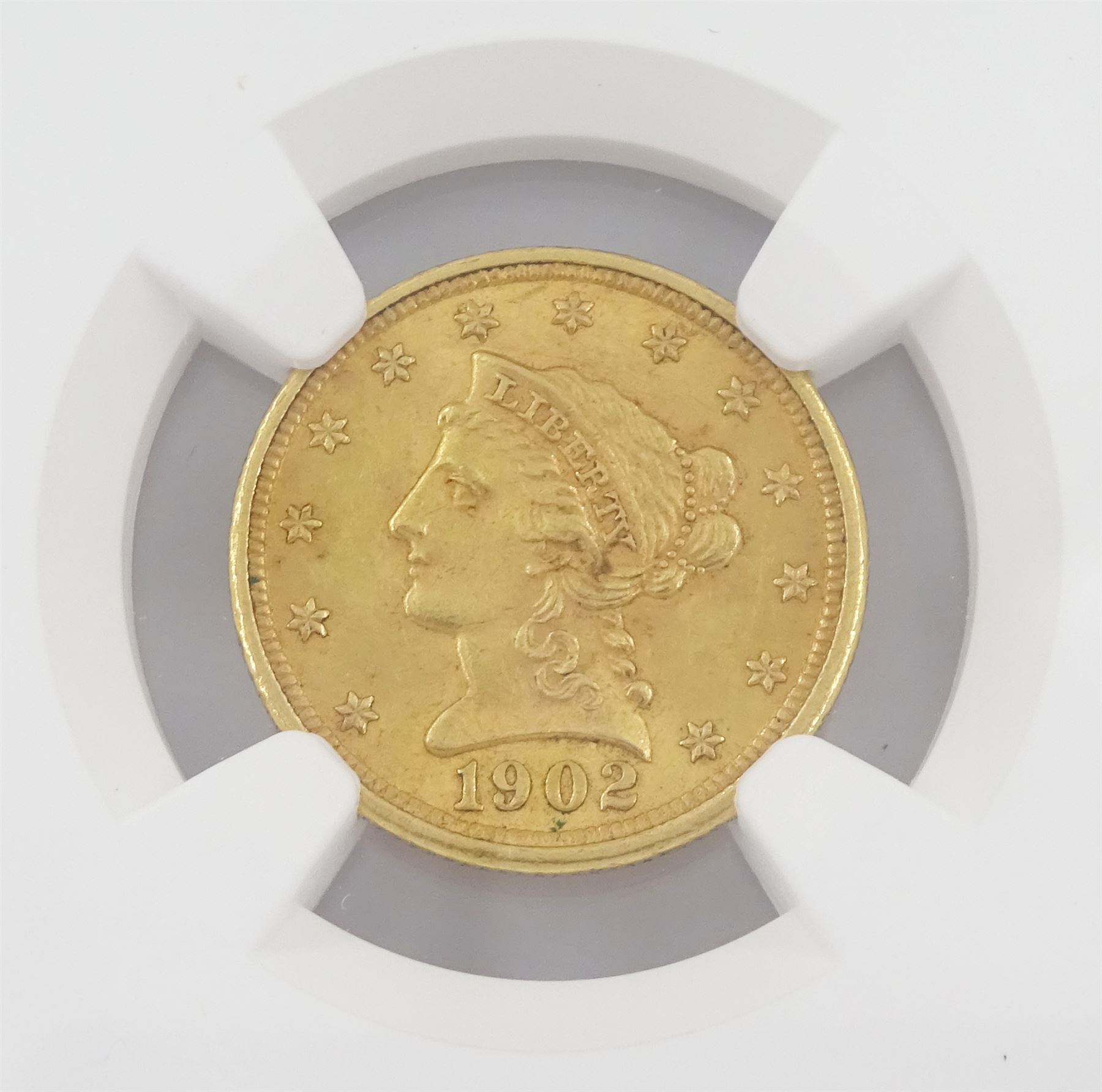 United States of America 1902 Liberty head gold two and a half dollar coin, encapsulated and graded MS62 by NGC